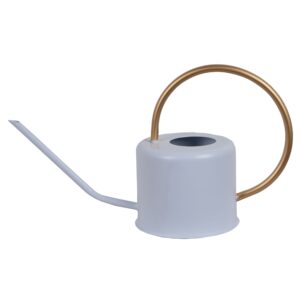 biała konewka metalowa